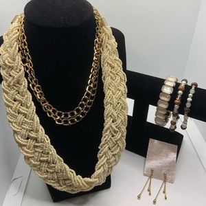 2 necklaces, 3 bracelets and one pair of earrings